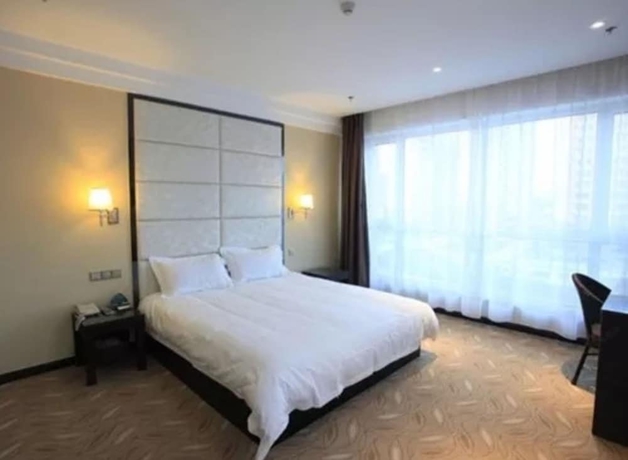 Imagen de la habitación del Hotel Greentree Inn Weihai International Beach. Foto 4