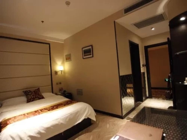 Imagen de la habitación del Hotel Greentree Inn Weihai International Beach. Foto 5