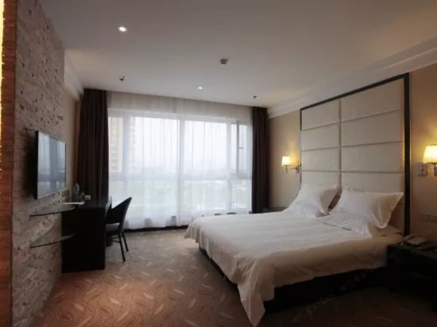Imagen de la habitación del Hotel Greentree Inn Weihai International Beach. Foto 6