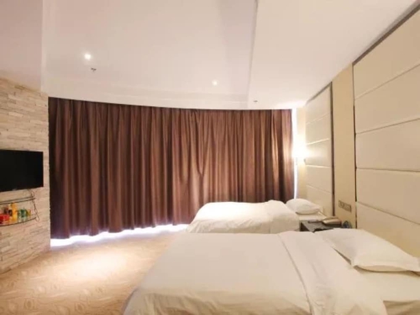 Imagen de la habitación del Hotel Greentree Inn Weihai International Beach. Foto 9
