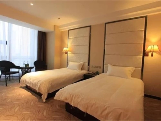 Imagen de la habitación del Hotel Greentree Inn Weihai International Beach. Foto 10