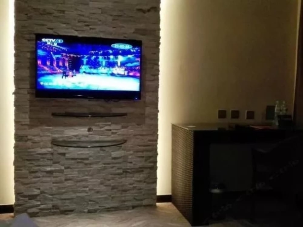 Imagen de la habitación del Hotel Greentree Inn Weihai International Beach. Foto 12