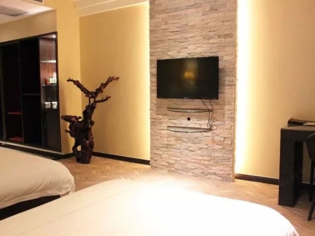 Imagen de la habitación del Hotel Greentree Inn Weihai International Beach. Foto 13