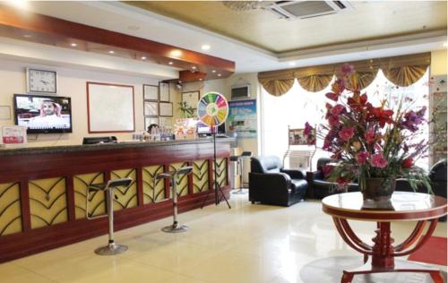Imagen de la habitación del Hotel Greentree Inn Weihai North Qingdao Road Express. Foto 10
