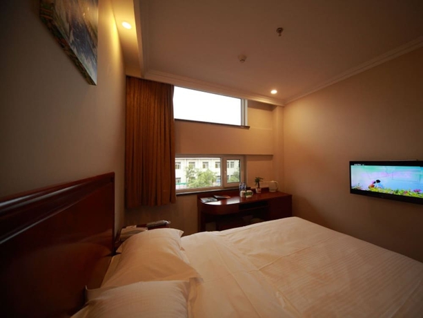 Imagen de la habitación del Hotel Greentree Inn Yantai Longkou East Bus Station Shell. Foto 8