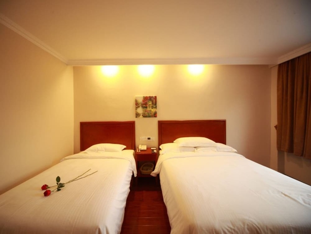 Imagen de la habitación del Hotel Greentree Inn Yantai Longkou East Bus Station Shell. Foto 13