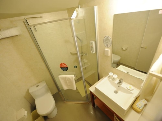 Imagen de la habitación del Hotel Greentree Inn Yantai Longkou East Bus Station Shell. Foto 15
