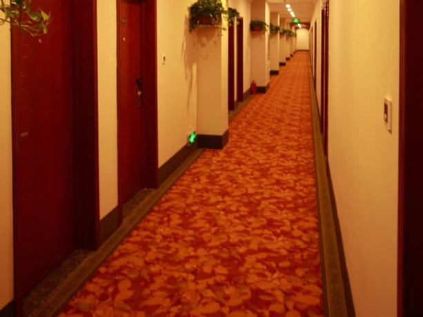 Imagen de los interiores del Hotel Greentree Inn Yantai Longkou East Bus Station Shell. Foto 18