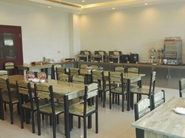 Imagen del bar/restaurante del Hotel Greentreeinn Jiading F1circuit Fangtai Hardwaremarket. Foto 3