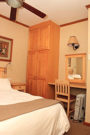 Imagen de la habitación del Hotel Greenway Woods Resort. Foto 5