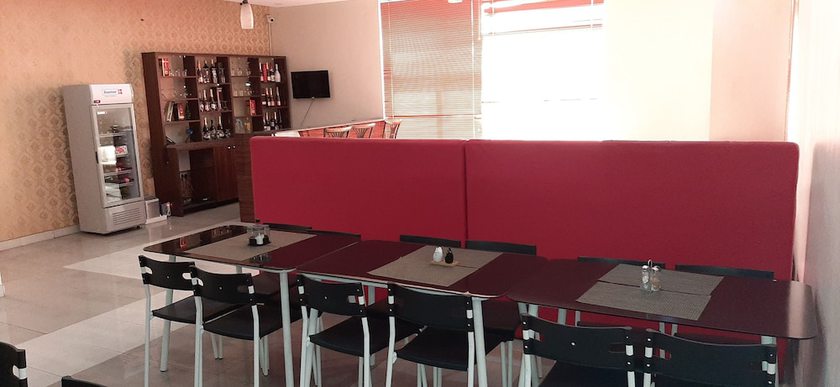 Imagen del bar/restaurante del Hotel Greenwood Courts And Suites. Foto 2