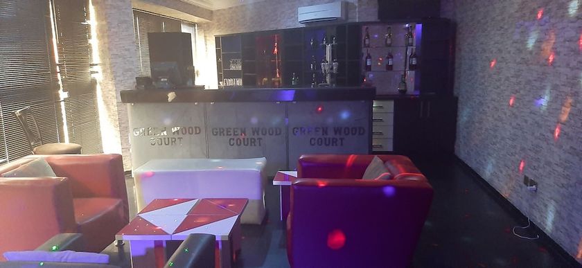 Imagen del bar/restaurante del Hotel Greenwood Courts And Suites. Foto 3