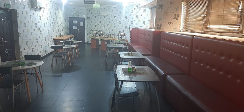 Imagen del bar/restaurante del Hotel Greenwood Courts And Suites. Foto 4