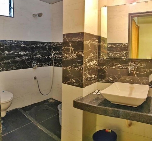 Imagen de la habitación del Hotel Greenwood countryside resort. Foto 7