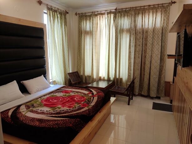 Imagen de la habitación del Hotel Greenwoods Inn. Foto 19