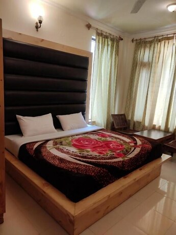 Imagen de la habitación del Hotel Greenwoods Inn. Foto 22