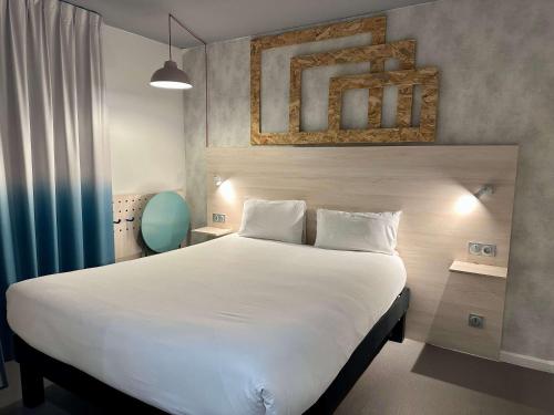 Imagen de la habitación del Hotel Greet Bordeaux Aeroport. Foto 15