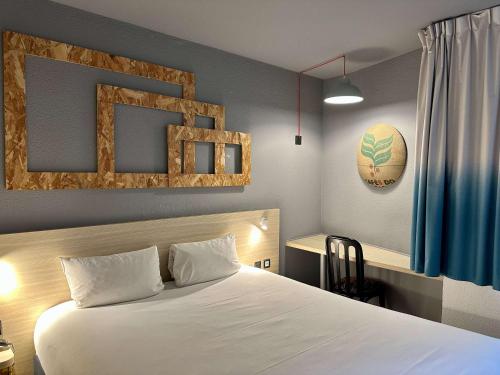 Imagen de la habitación del Hotel Greet Bordeaux Aeroport. Foto 16