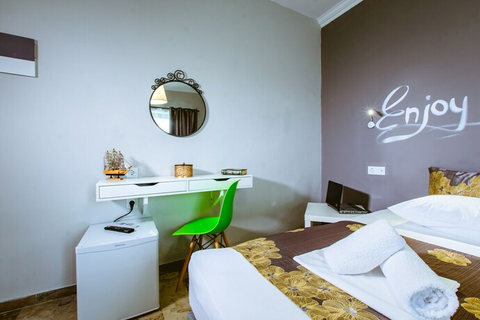 Imagen de la habitación del Hotel Gregory Comfort. Foto 16