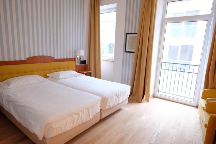 Imagen de la habitación del Hotel Greif Maria Theresia. Foto 4