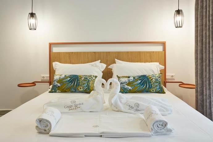 Imagen de la habitación del Hotel GreyStone Suites. Foto 10