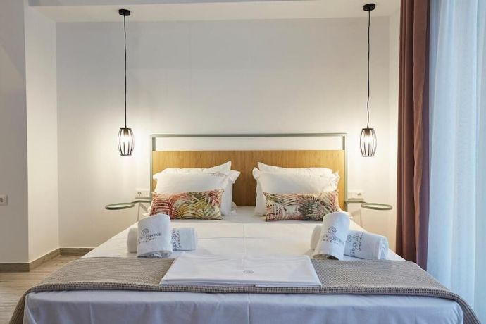 Imagen de la habitación del Hotel GreyStone Suites. Foto 11