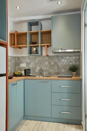 Imagen de la habitación del Hotel GreyStone Suites. Foto 16