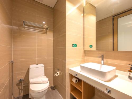 Imagen de la habitación del Hotel Greystone 99 Suites. Foto 15