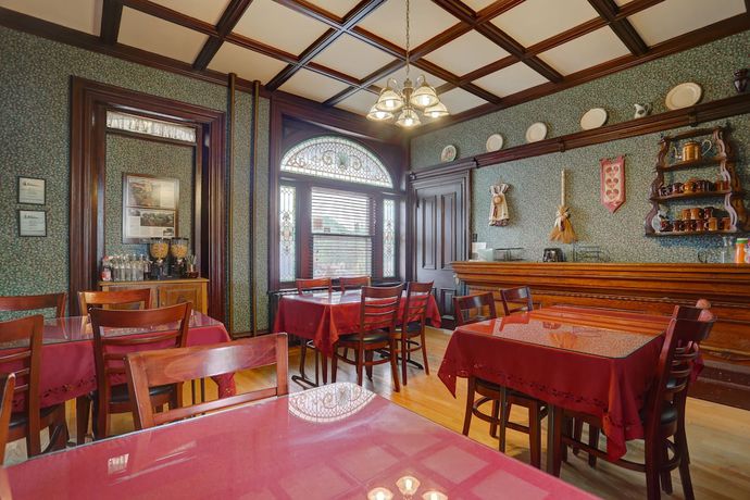 Imagen del bar/restaurante del Hotel Greystone Manor Victorian Inn. Foto 3