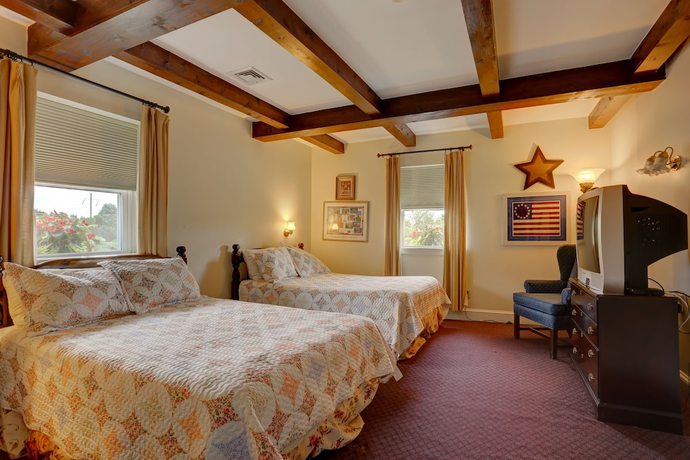 Imagen de la habitación del Hotel Greystone Manor Victorian Inn. Foto 6