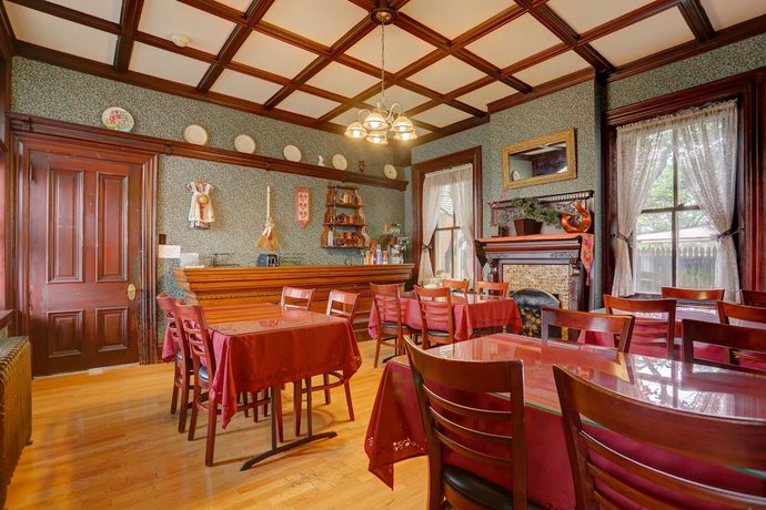 Imagen del bar/restaurante del Hotel Greystone Manor Victorian Inn. Foto 4