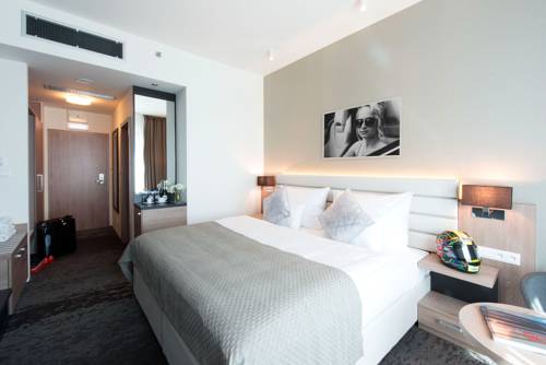 Imagen de la habitación del Hotel Grid. Foto 14