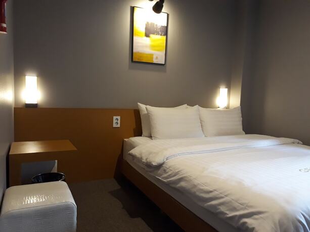 Imagen de la habitación del Hotel Grid Inn. Foto 14