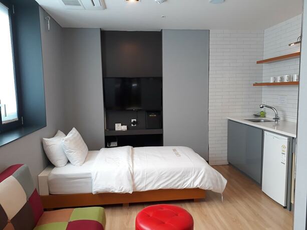 Imagen de la habitación del Hotel Grid Inn. Foto 16