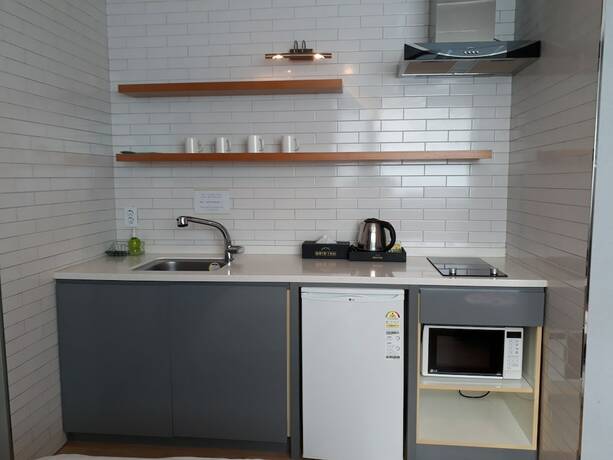 Imagen de la habitación del Hotel Grid Inn. Foto 25