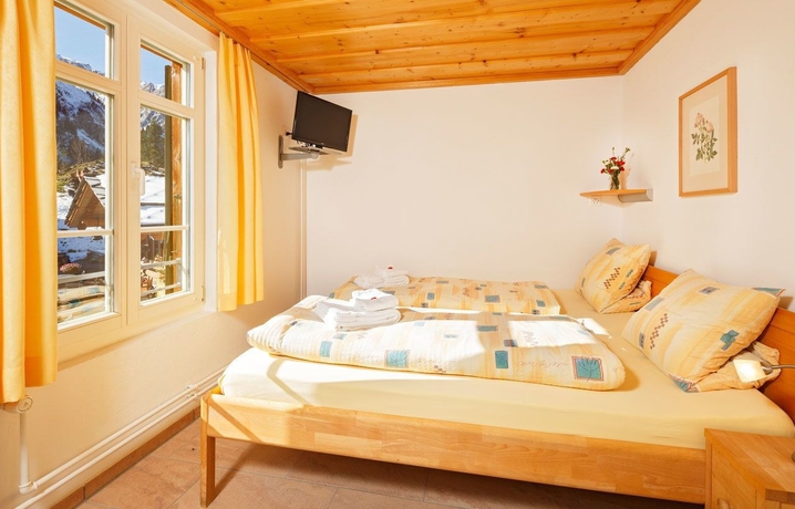 Imagen de la habitación del Hotel Griesalp Hotels. Foto 10