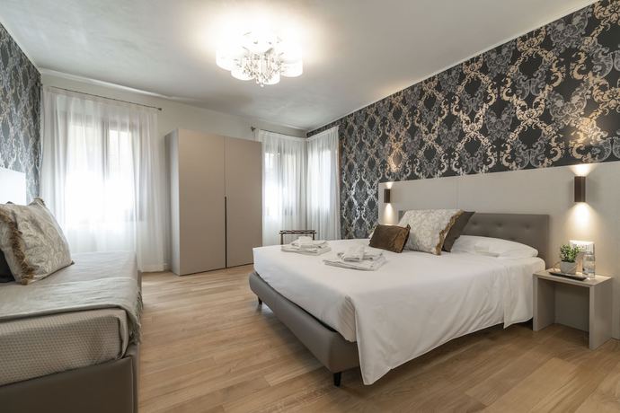 Imagen de la habitación del Hotel Grifoni Boutique Hotel. Foto 9