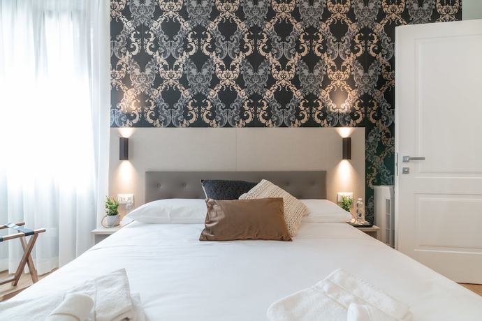 Imagen de la habitación del Hotel Grifoni Boutique Hotel. Foto 10