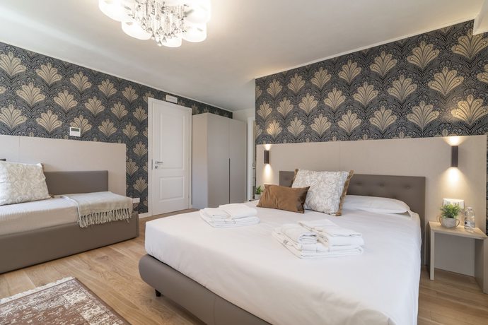 Imagen de la habitación del Hotel Grifoni Boutique Hotel. Foto 13