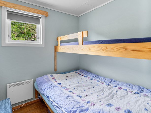 Imagen de la habitación del Hotel Grimen Camping. Foto 8