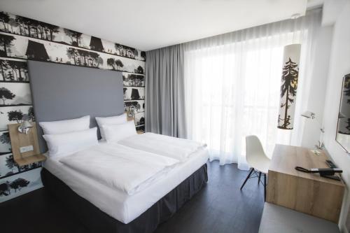 Imagen de la habitación del Hotel Grimms Hanau. Foto 12