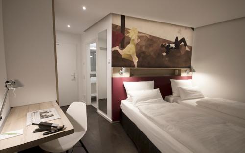 Imagen de la habitación del Hotel Grimms Hanau. Foto 13