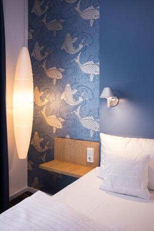 Imagen de la habitación del Hotel Grimms Hanau. Foto 17