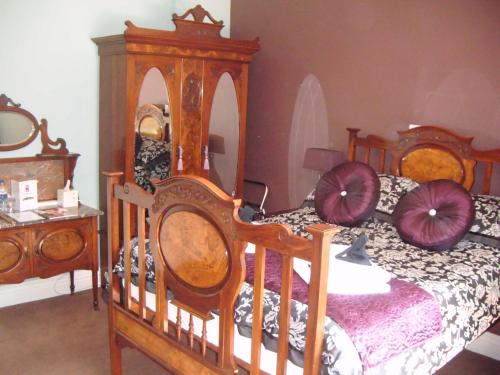 Imagen de la habitación del Hotel Grimscote Manor. Foto 8