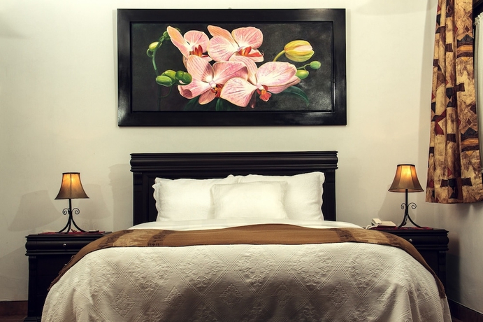 Imagen de la habitación del Hotel Gringo Bill's Boutique. Foto 16