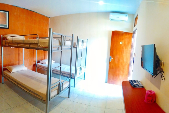 Imagen de la habitación del Hotel Griya Alisha. Foto 5