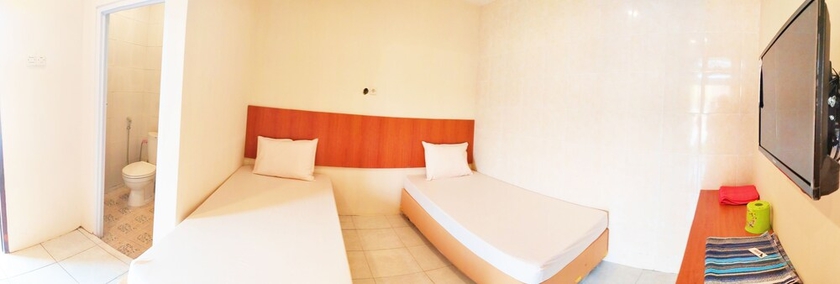 Imagen de la habitación del Hotel Griya Alisha. Foto 10