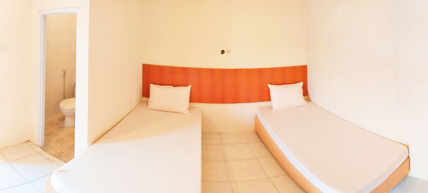 Imagen de la habitación del Hotel Griya Alisha. Foto 11