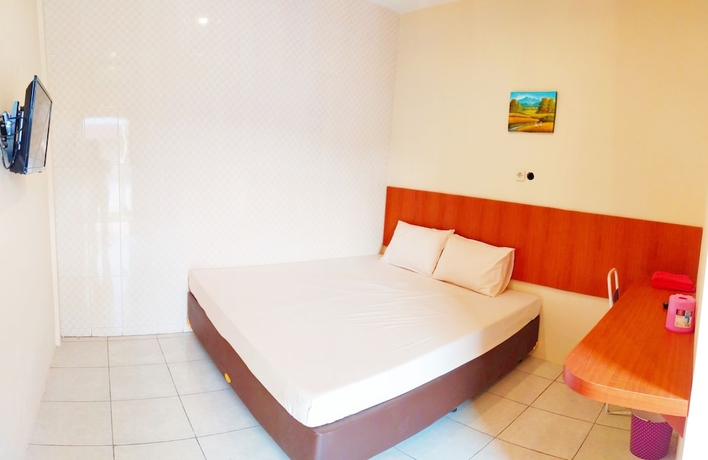 Imagen de la habitación del Hotel Griya Alisha. Foto 13