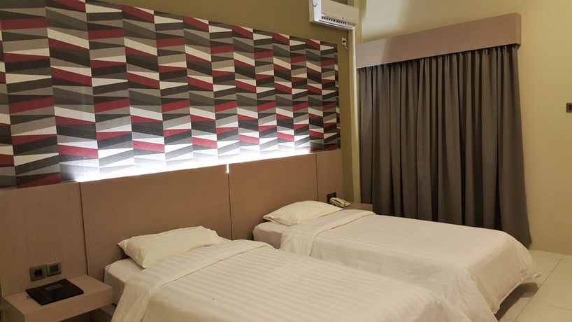 Imagen de la habitación del Hotel Griya Asri. Foto 4